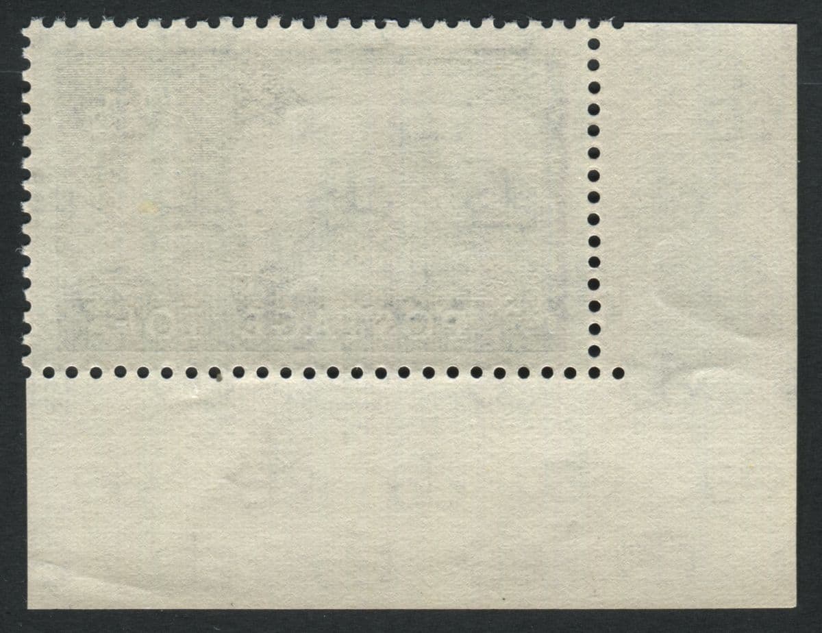 SG597 SpecT16a 10/- Ultramarine on cream paper, with 2 plate dots in margin, scarce variety